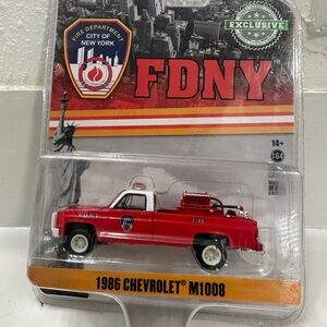 Greenlight 1:64 scale diecast model of the 1986 Chevrolet M1008 4x4 FDNY truck
